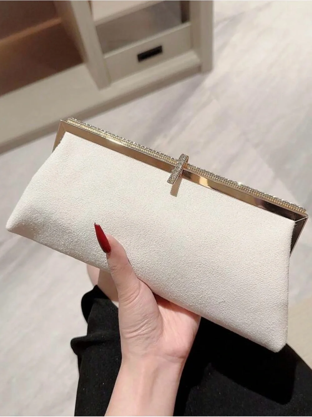 Elegant Cream Evening Clutch with Gold Accents